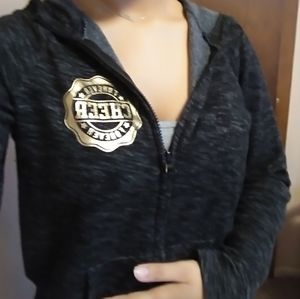 Soft blackish grey long sleeve sweater.